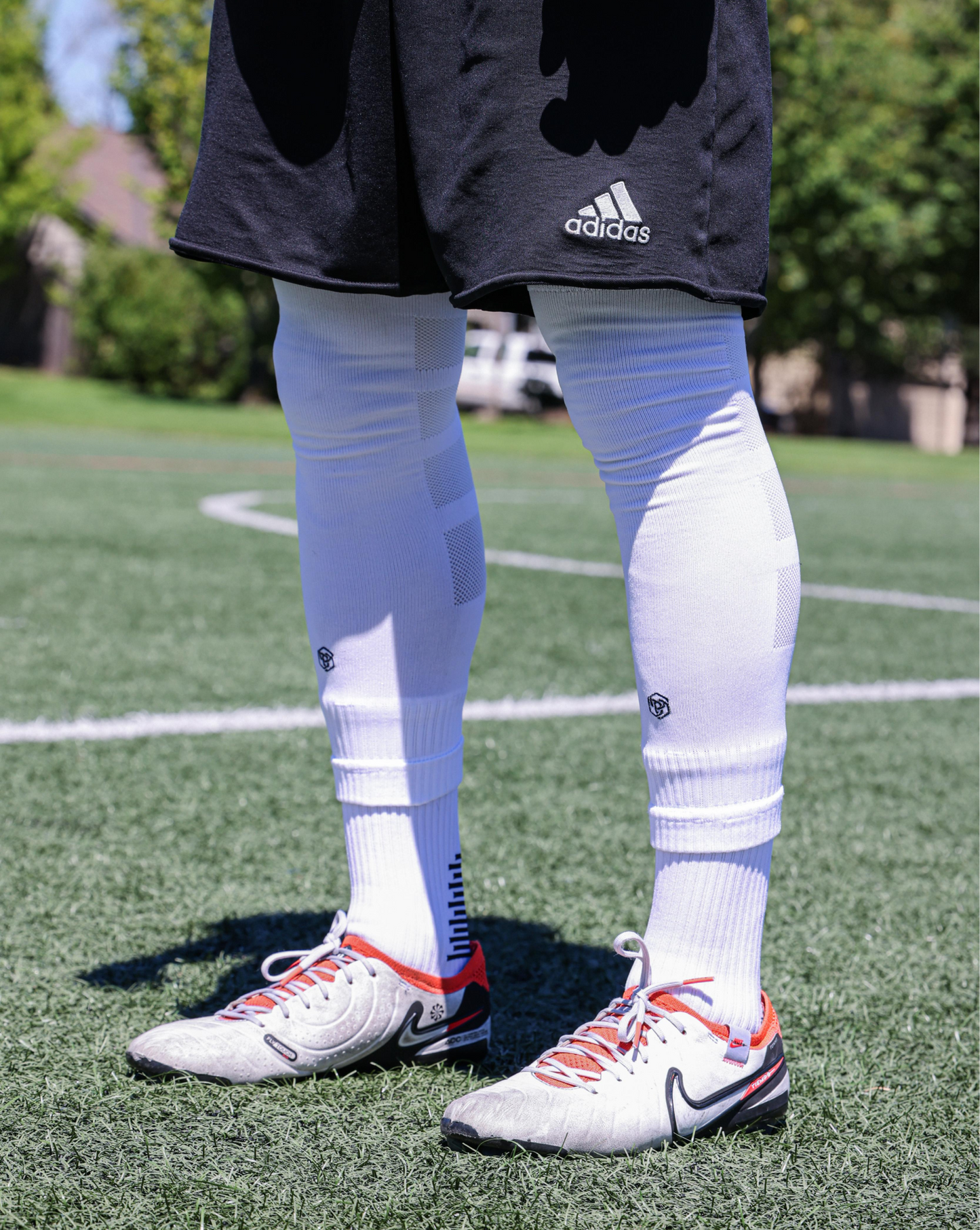 SL FLEX Sock Sleeve White Side View With Cleats