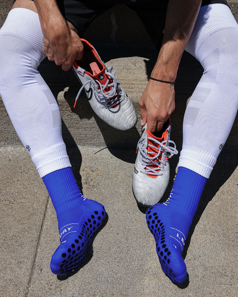 SL PRO Grip Socks Blue While Sitting Down