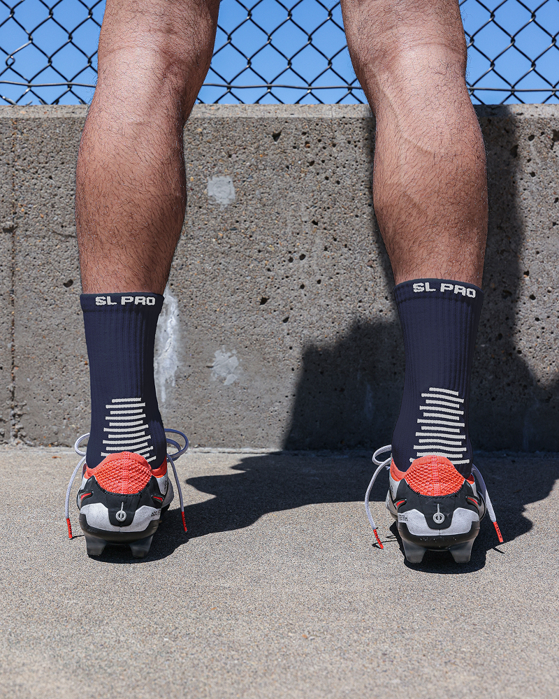 SL PRO Grip Socks Navy Back View with Cleats