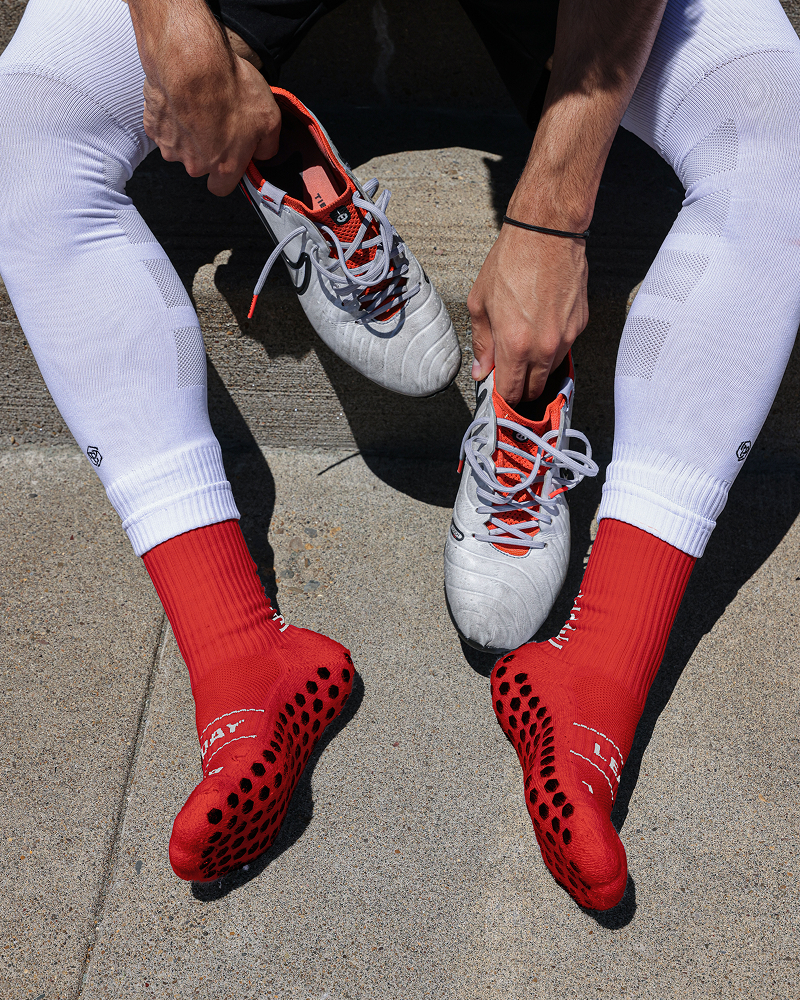 SL PRO Grip Socks Red While Sitting Down