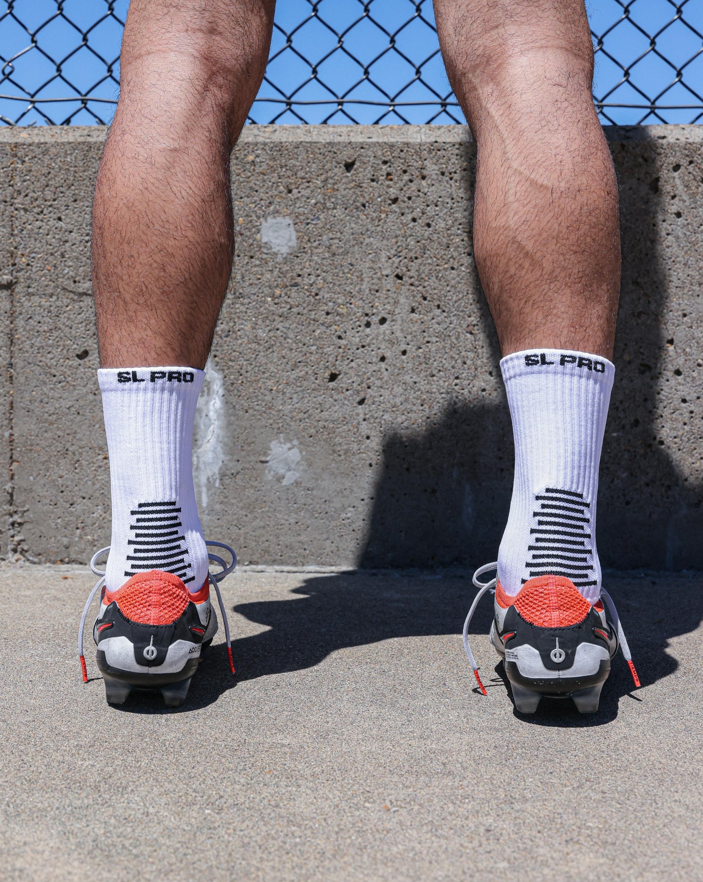 SL PRO Grip Socks White Back View with Cleats