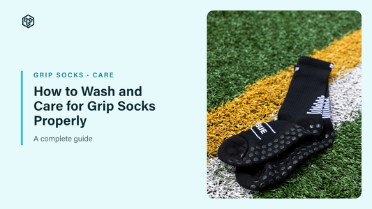 How to Wash and Care for Grip Socks blog header: black Sunday League grip socks on a turf line