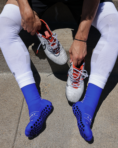 SL PRO Grip Socks Blue While Sitting Down