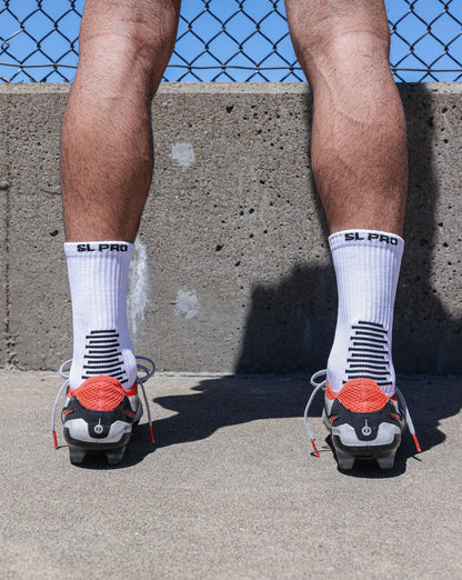 SL PRO Grip Socks White Back View with Cleats